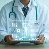 Doctor holding a tablet that displays health graphics above it
